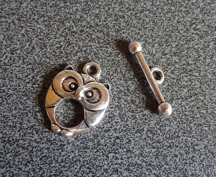 T-l&aring;s Ugle s&oslash;lvbelagt